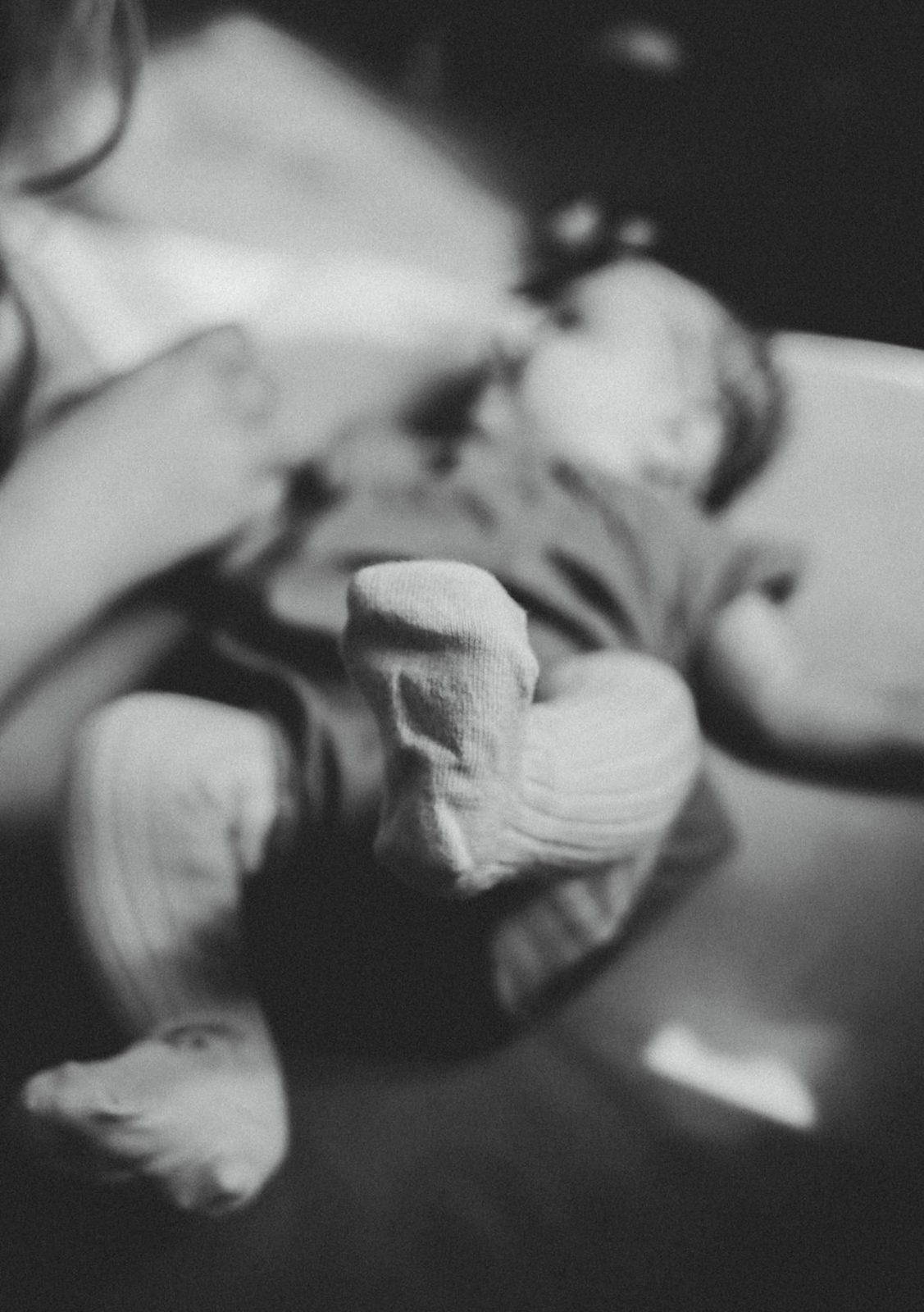 Baby's feet, a quiet family moment